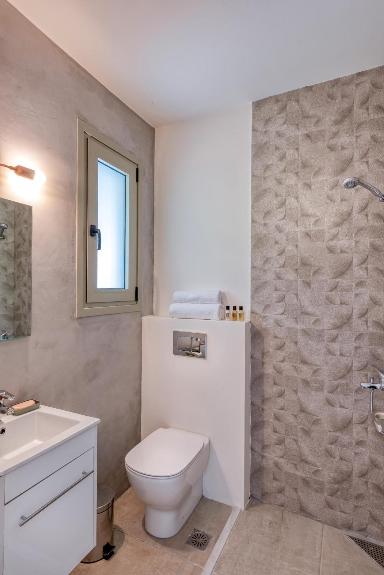 Saronis Suites Saronida Стая снимка
